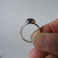 silver ring with trillion iolite