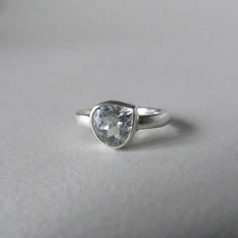silver ring with pear white topaz