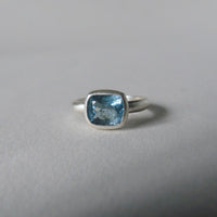 silver ring with cushion salt and pepper aquamarine