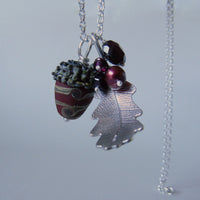 large silver oak leaf and russet swirl glass acorn necklace