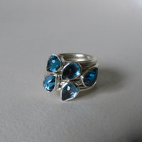 silver ring with pear London blue topaz