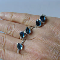 silver ring with pear London blue topaz