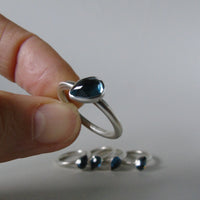 silver ring with pear London blue topaz