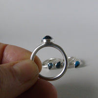 silver ring with pear London blue topaz