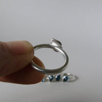 silver ring with pear London blue topaz