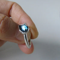 silver ring with pear London blue topaz