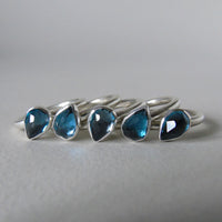 silver ring with pear London blue topaz