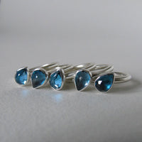 silver ring with pear London blue topaz