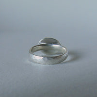 silver ring with freeform cloudy serpentine