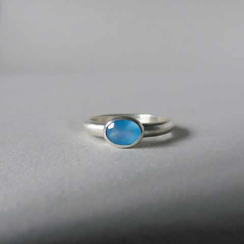 silver ring with faceted blue chalcedony