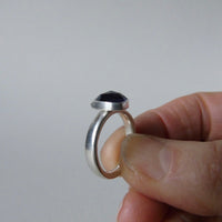 silver ring with trillion iolite