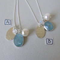 silver snowflake and frost necklaces