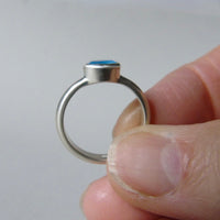silver ring with faceted blue chalcedony