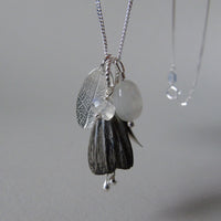 silver leaf and porcelain pod necklace