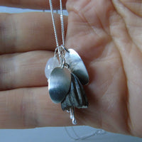 silver leaf and porcelain pod necklace