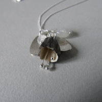 silver leaf and porcelain pod necklace