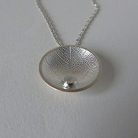 silver domed leaf necklace with dewdrop