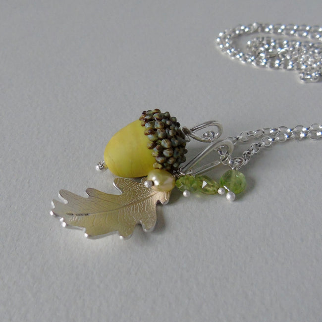 large silver oak leaf and green glass acorn necklace