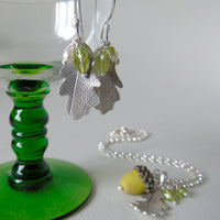 silver oak leaf and green peridot earrings