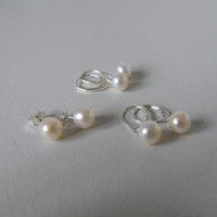 silver earrings with cream bouton pearls