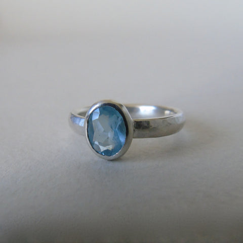 silver ring with oval cloudy blue aquamarine