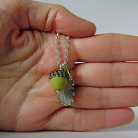 small  silver oak leaf and green glass acorn necklace
